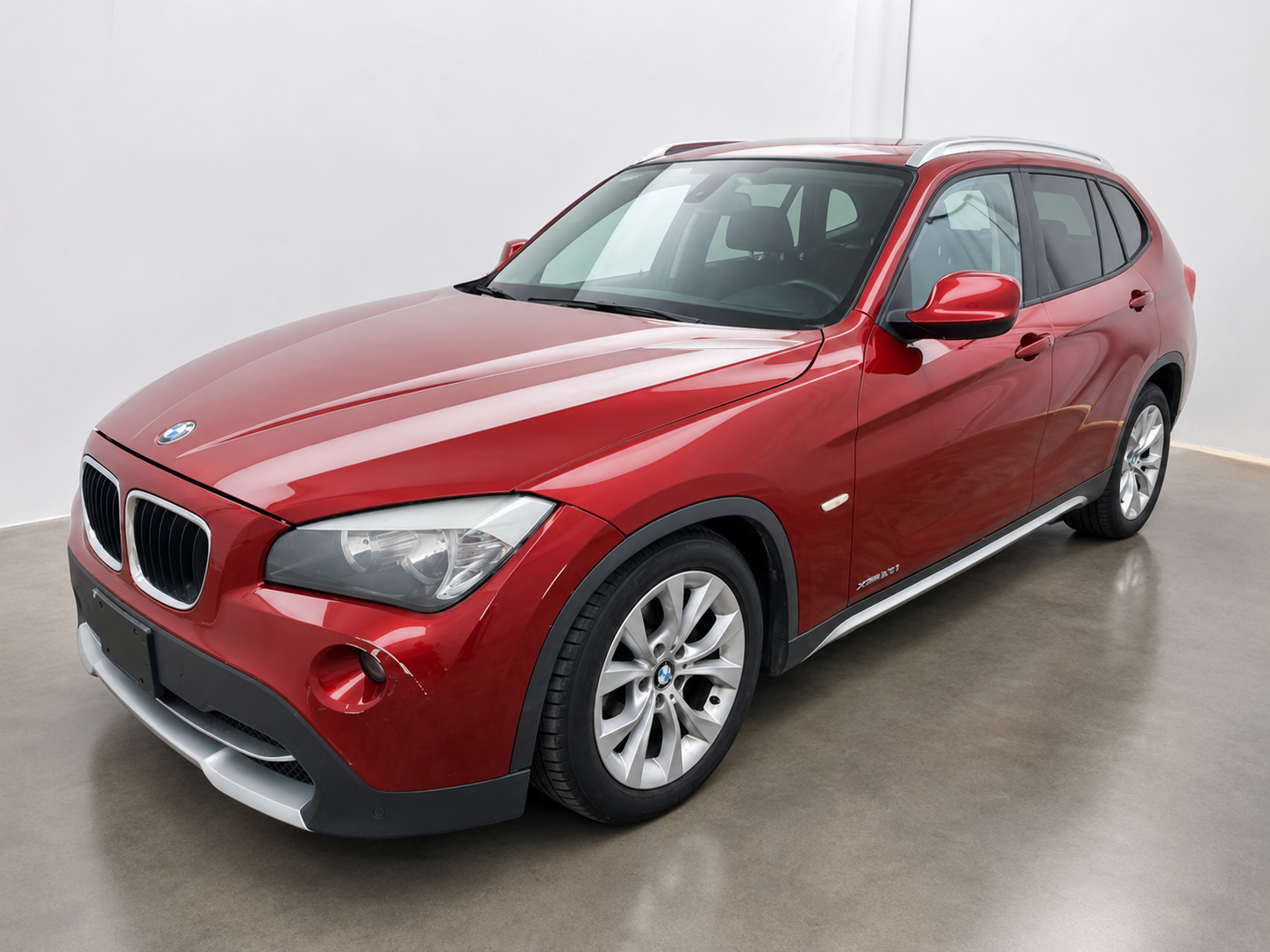2011 BMW X1 โ front three-quarter left